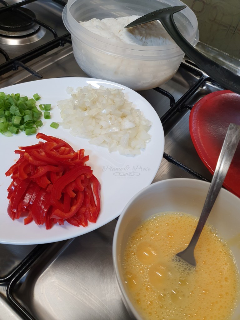 Préparation des "Noodle Stir Fry" ou les nouilles sautées de Singapour